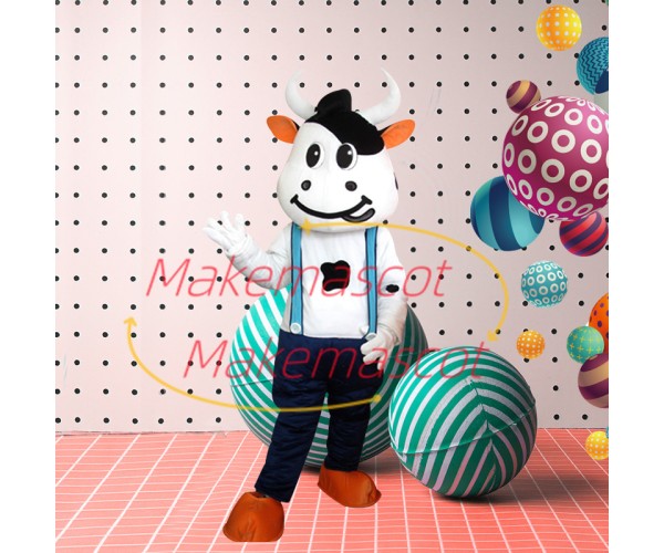 Lively Cartoon Cow In Suspenders Mascot Costume Lively Cartoon Cow In Suspenders Mascot Costume