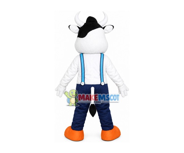 Lively Cartoon Cow In Suspenders Mascot Costume Lively Cartoon Cow In Suspenders Mascot Costume
