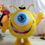 Yellow Big Eyed Monster With Long Tentacles Cartoon Mascot Costume
