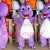 Active Cartoon Purple Baby Dinosaur Mascot Costume
