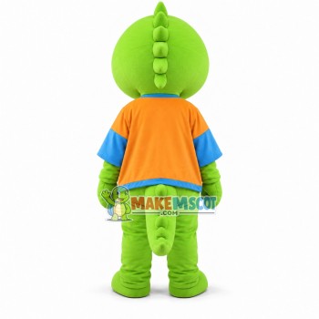 Cartoon Green Dinosaur In Orange Coat Mascot Costume Cartoon Green Dinosaur In Orange Coat Mascot Costume